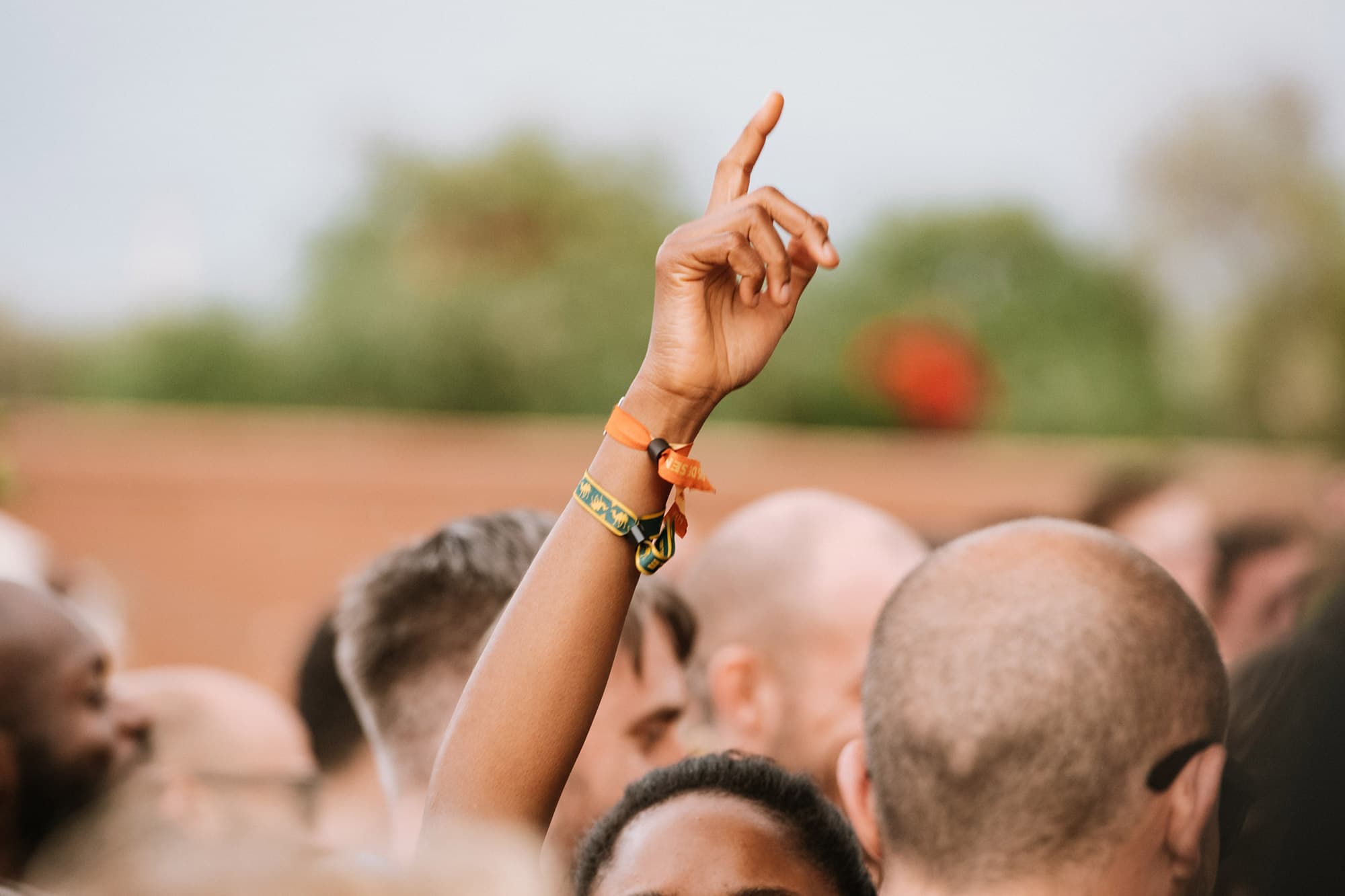 Beat Hotel Marrakech crowd person holding a hand up